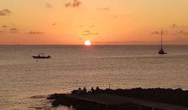 cayman lobster pot sunset